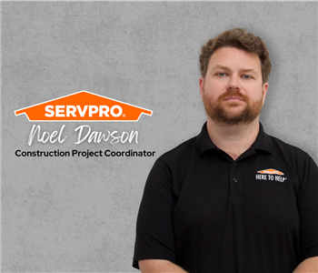 Servpro employee, man in black polo